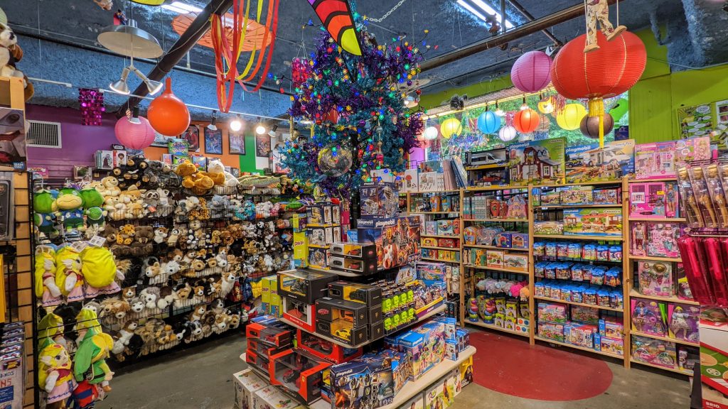 Colorful and packed toy store in Austin Texas. Weird lamps and games abound.