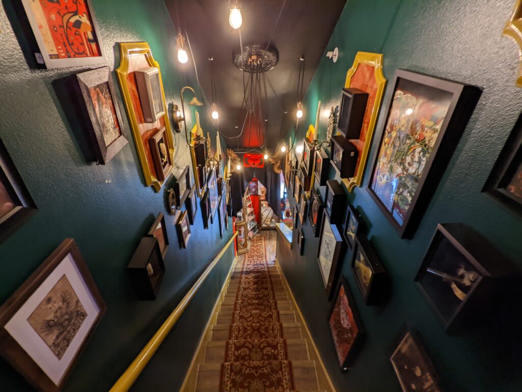Stairwell filled with mysterious paintings